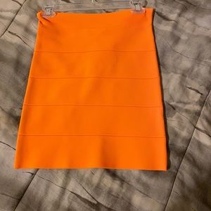 BCBG orange power skirt size m